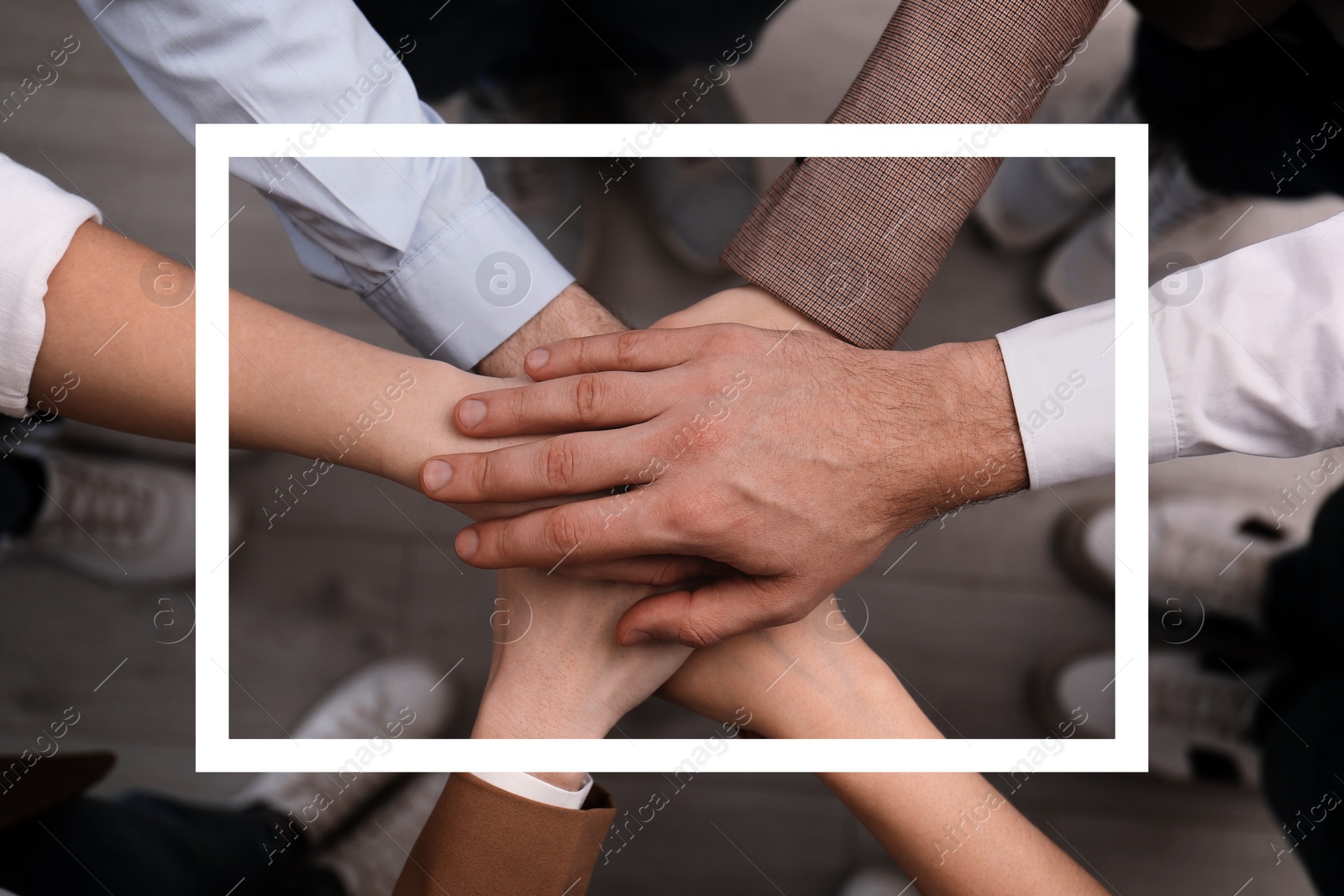 Image of Partnership, union and cooperation. Businesspeople joining hands together, top view