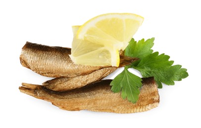Photo of Tasty canned sprats, lemon and parsley isolated on white, top view