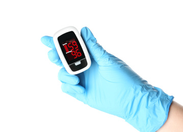 Photo of Doctor in latex gloves holding fingertip pulse oximeter on white background, closeup