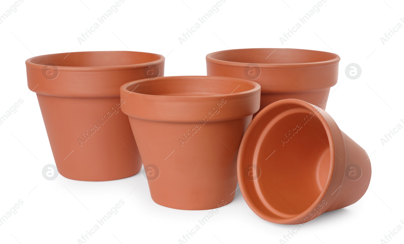 Photo of Empty clay flower pots isolated on white