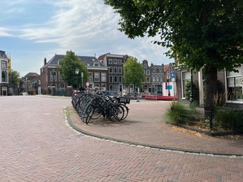 Photo of Beautiful viewparking with bicycles and buildings on city street