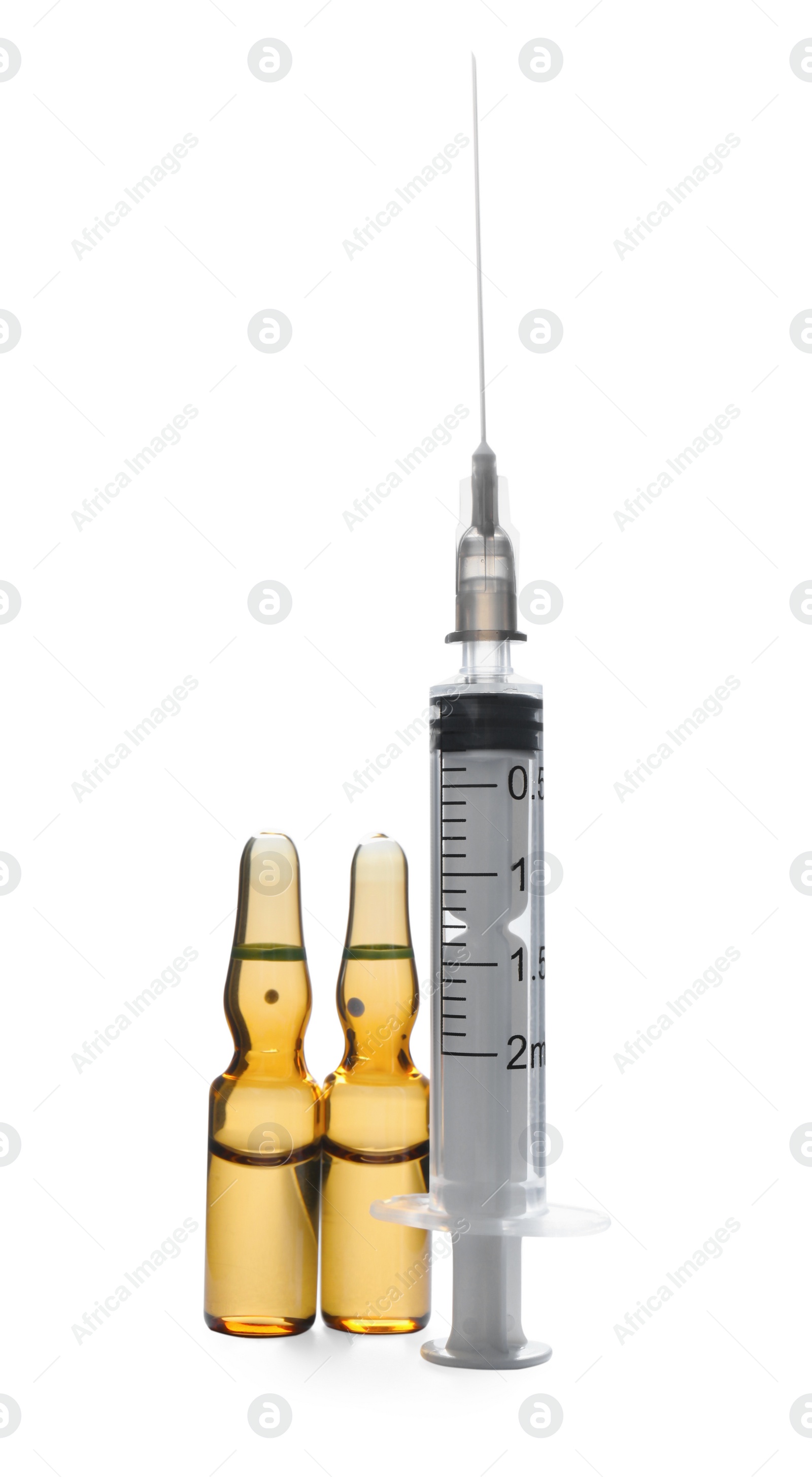 Photo of Syringe and ampules with medicine on white background