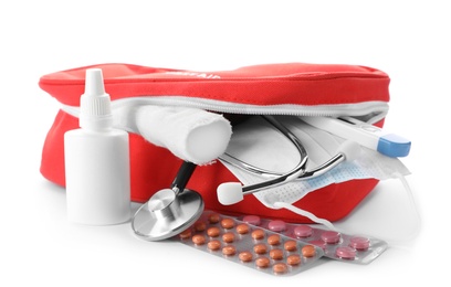 Photo of First aid kit on white background. Health care