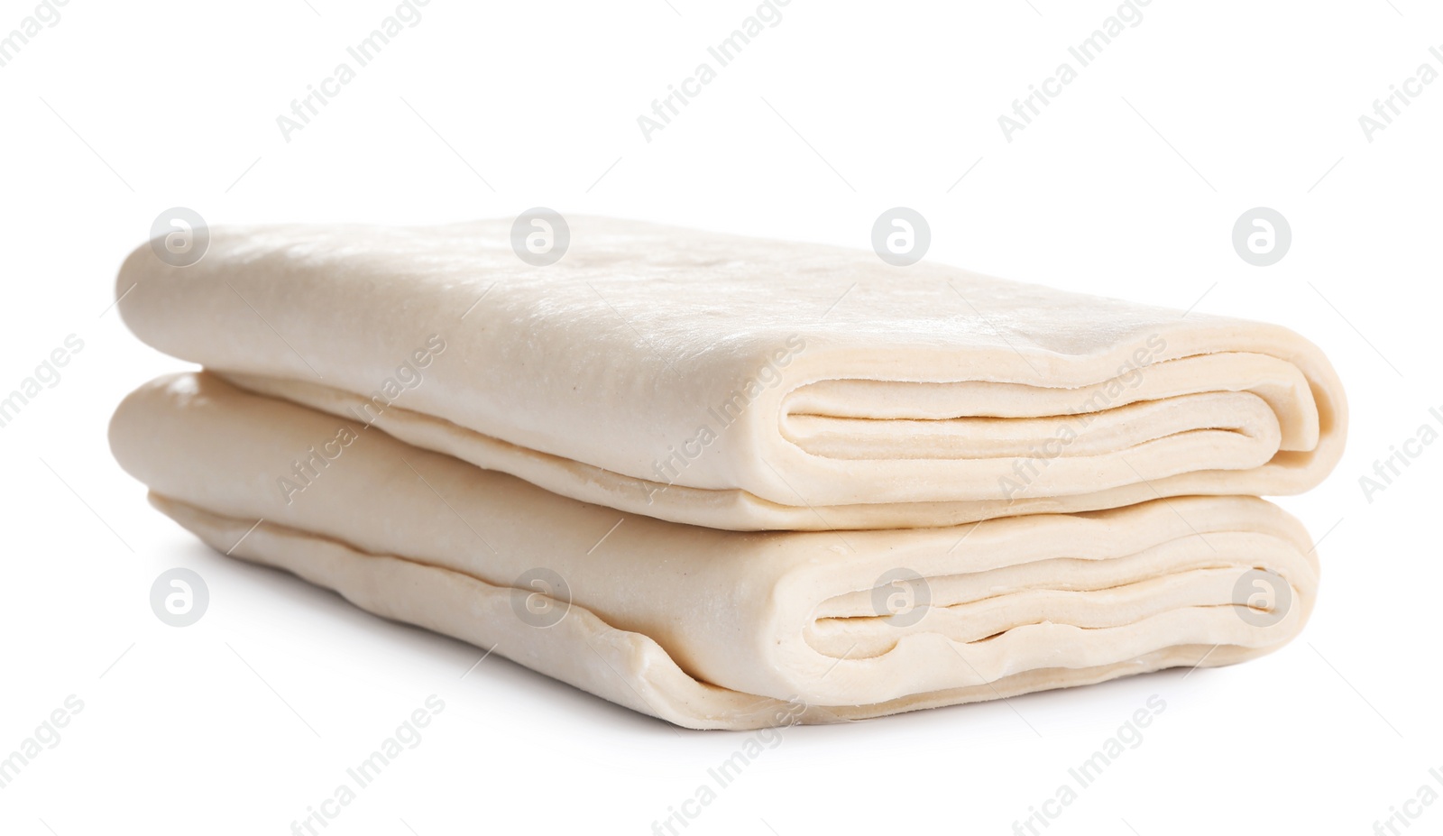 Photo of Fresh dough on white background. Puff pastry