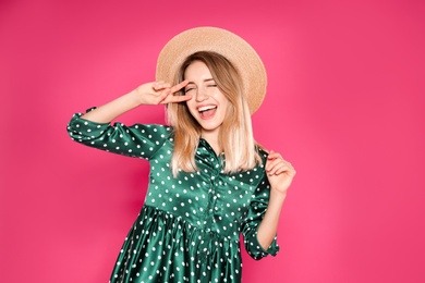 Portrait of emotional woman on color background