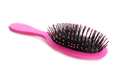 Photo of New modern hair brush on white background