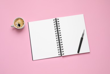 Photo of Flat lay composition with stylish notebook on pink background