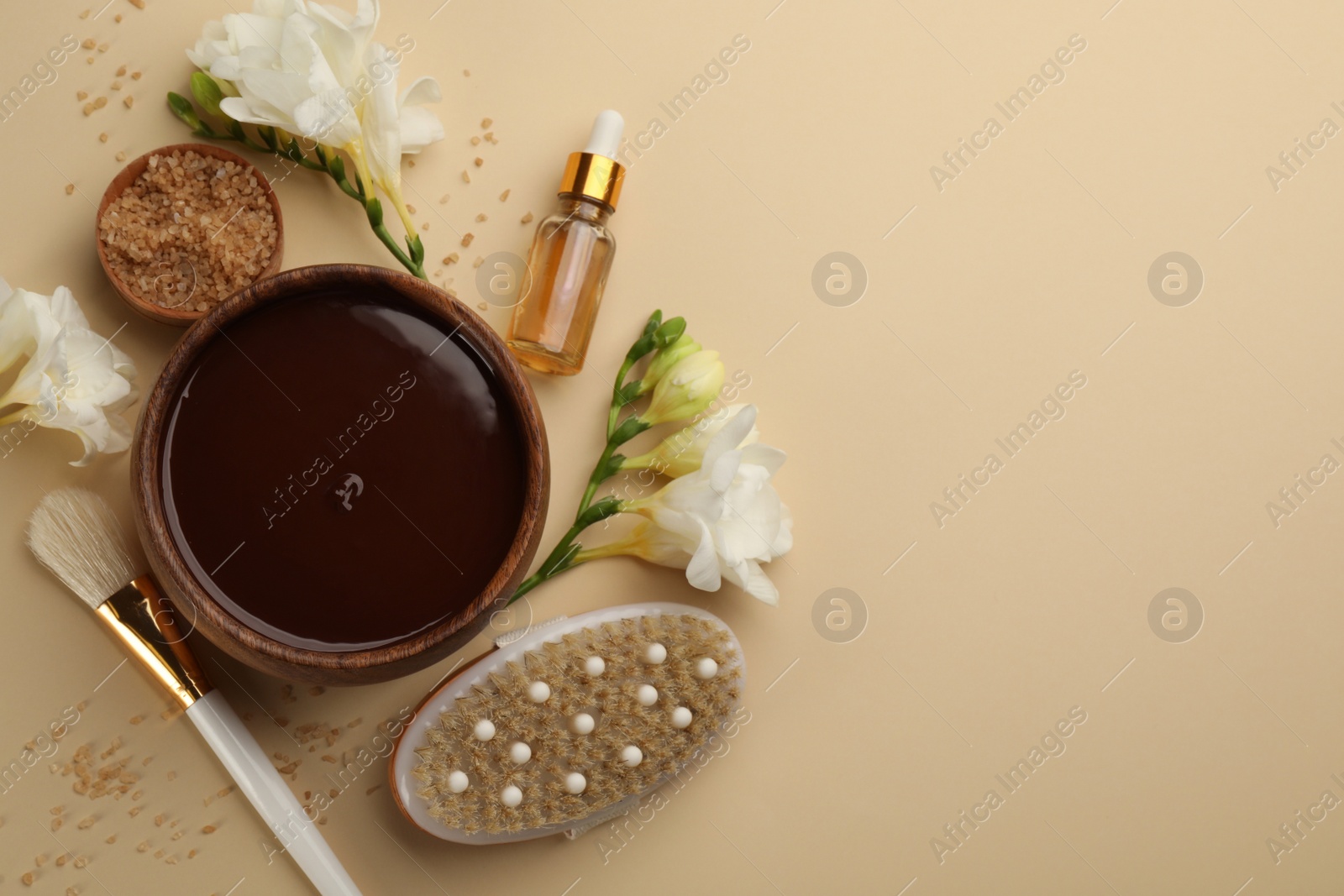 Photo of Flat lay composition with cosmetic product on beige background, space for text. Spa body wraps