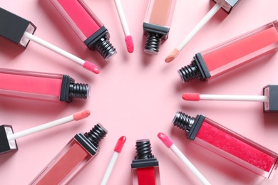 Composition of lipsticks on color background, flat lay