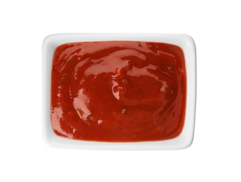 Rectangular bowl with spicy chili sauce on white background, top view