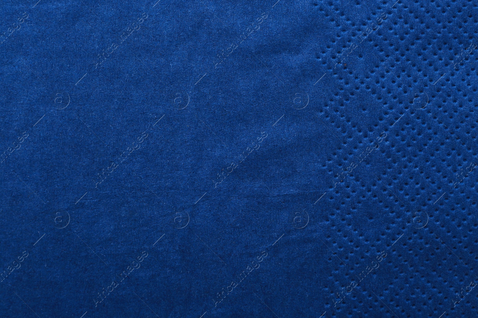 Photo of Clean paper napkin as background, top view