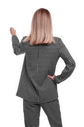 Businesswoman in suit on white background, back view