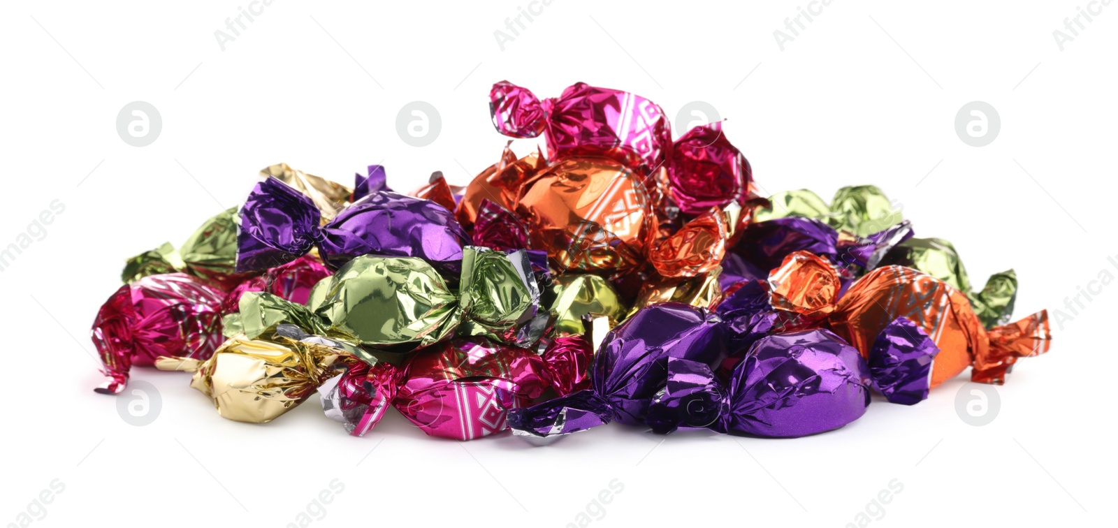 Photo of Candies in colorful wrappers isolated on white