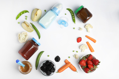 Photo of Frame of baby food, ingredients and accessories on white background, flat lay. Space for text