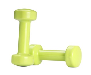 Light green dumbbells isolated on white. Sports equipment