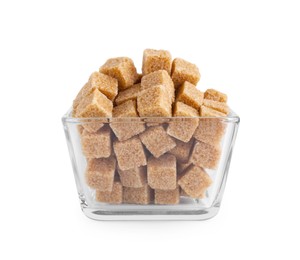 Photo of Brown sugar cubes in glass bowl isolated on white