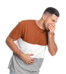 Photo of Man suffering from stomach ache and nausea on white background. Food poisoning