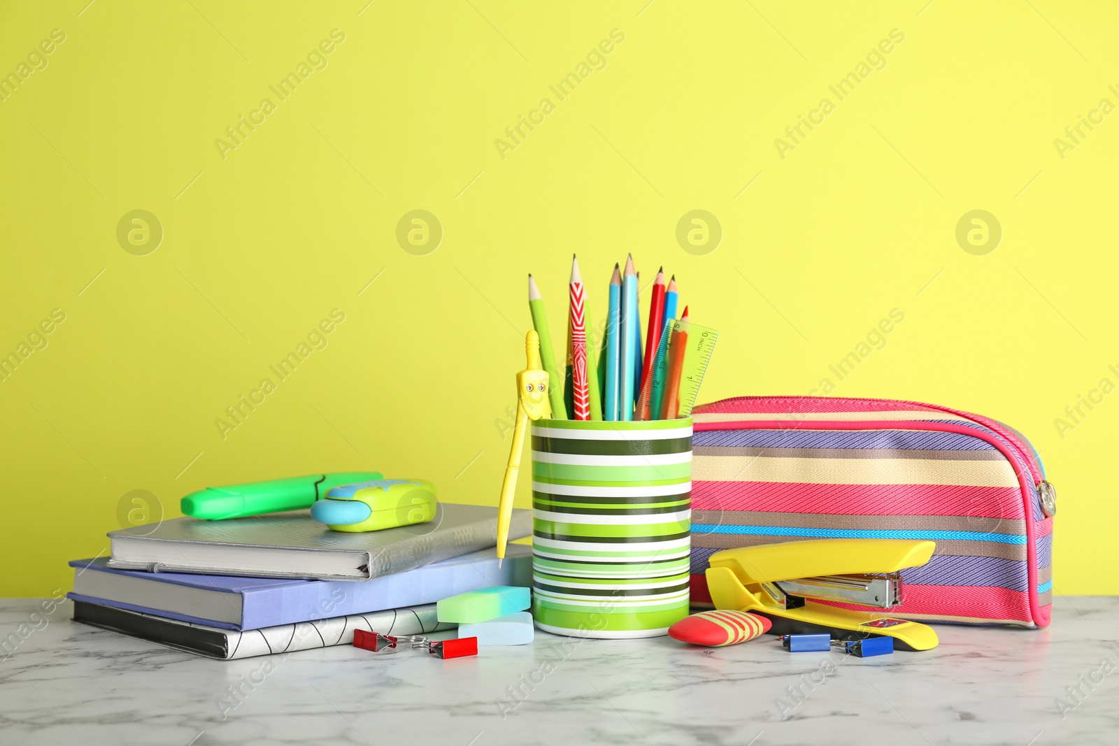 Photo of Different colorful stationery on table. Back to school