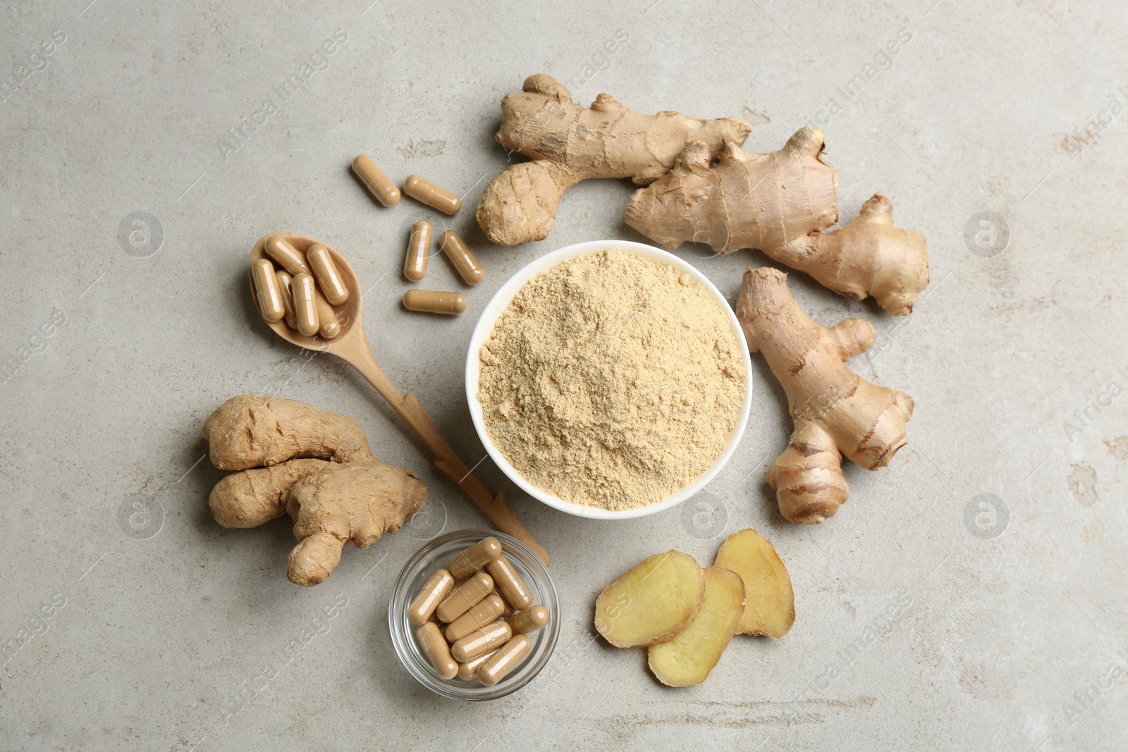 Photo of Flat lay composition with fresh and dry ginger on light grey table