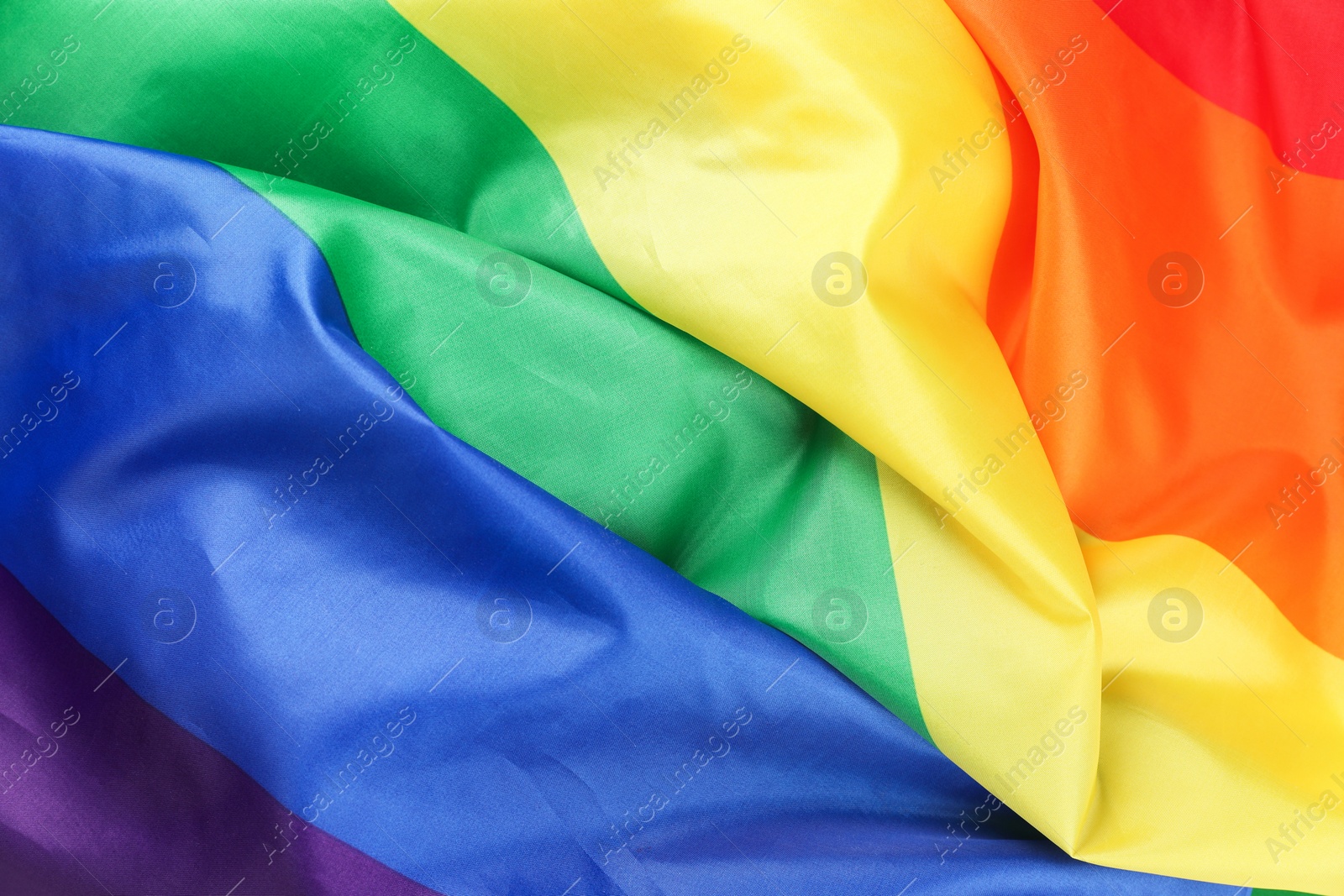 Photo of Rainbow LGBT flag as background, top view