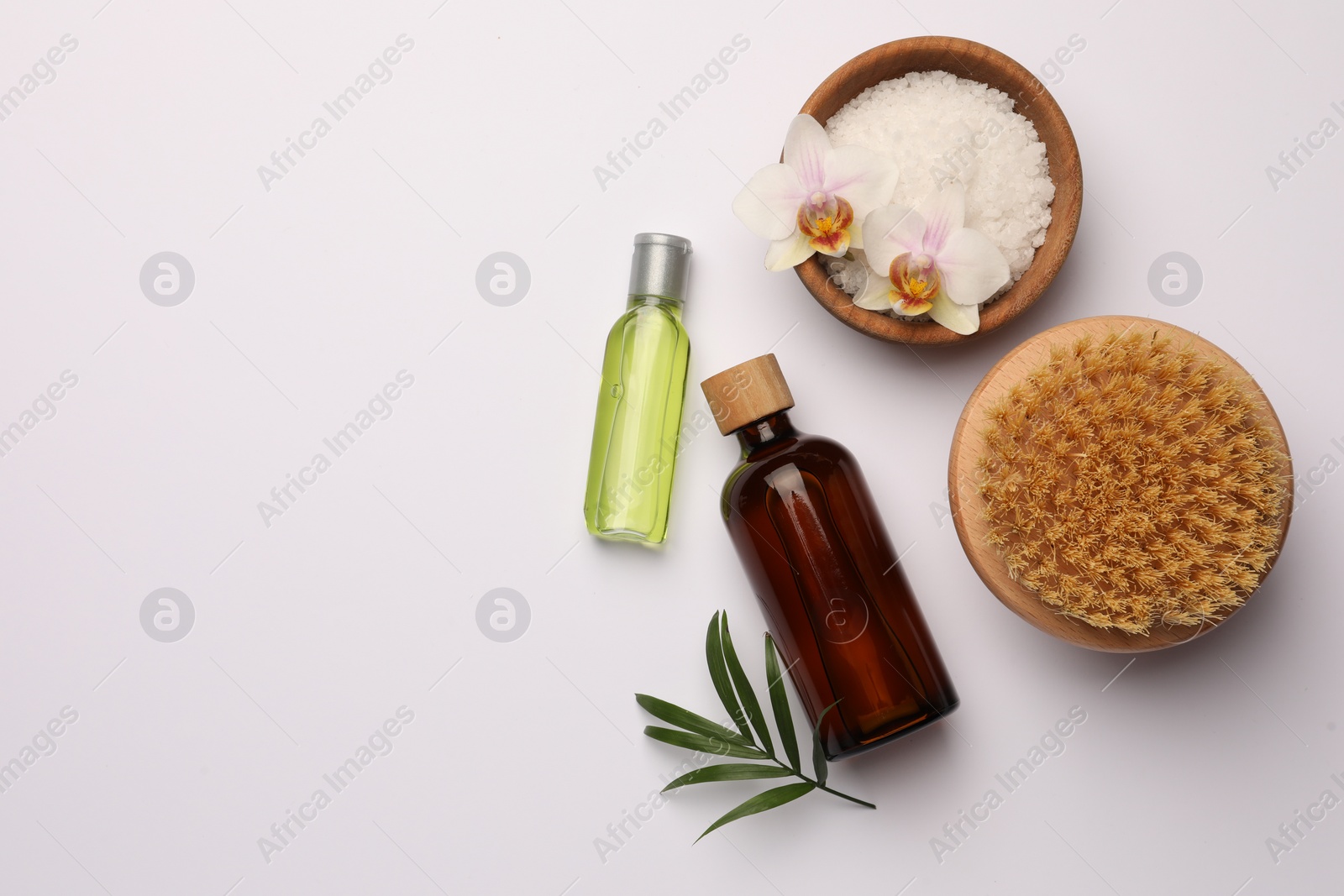 Photo of Flat lay composition with different spa products on white background. Space for text