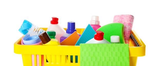 Yellow shopping basket with different household chemicals on white background