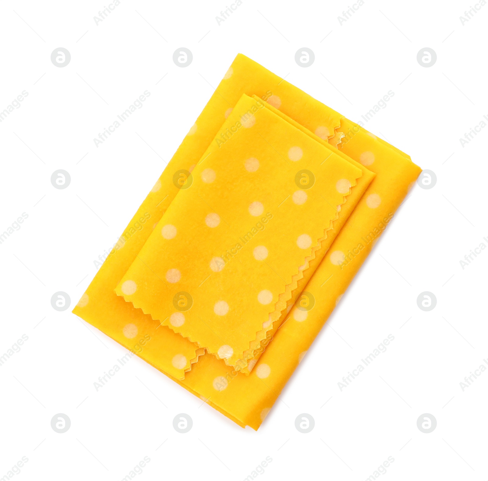 Photo of Reusable beeswax food wraps on white background, top view