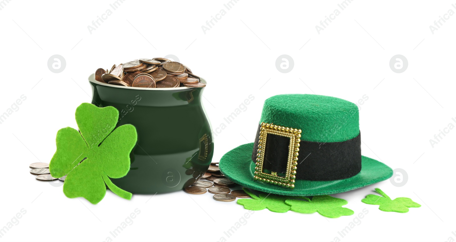 Photo of Pot of gold coins, hat and clover on white background. St. Patrick's Day celebration