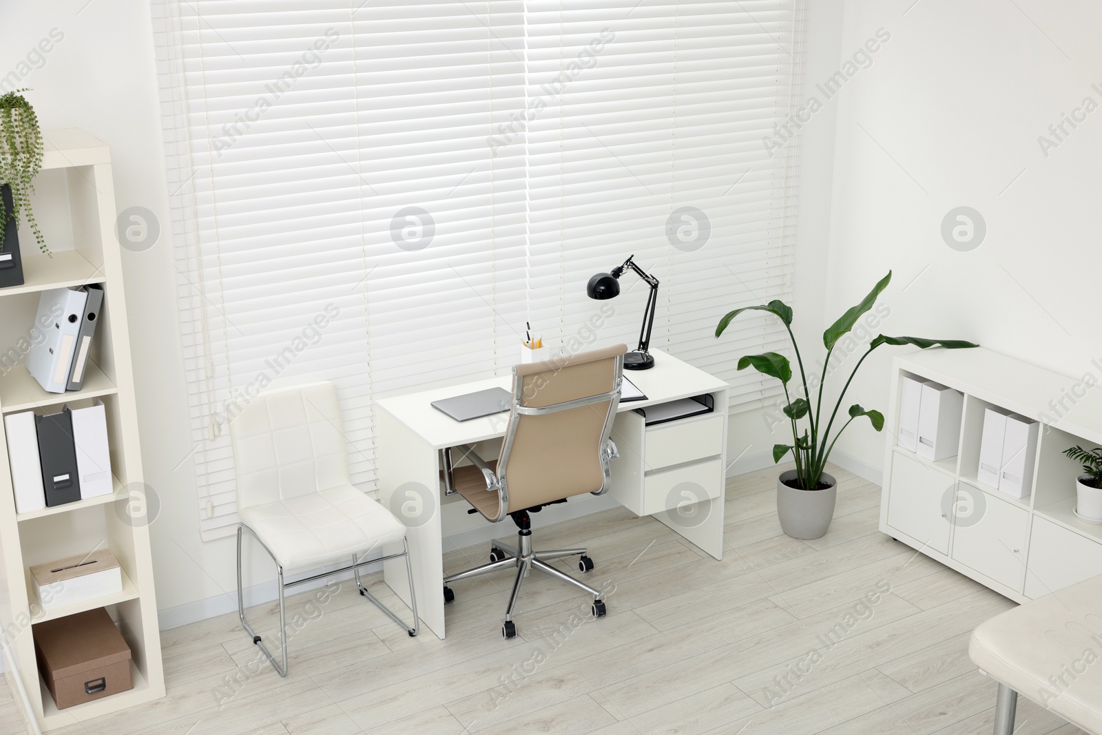 Photo of Modern medical office with doctor's workplace in clinic, above view