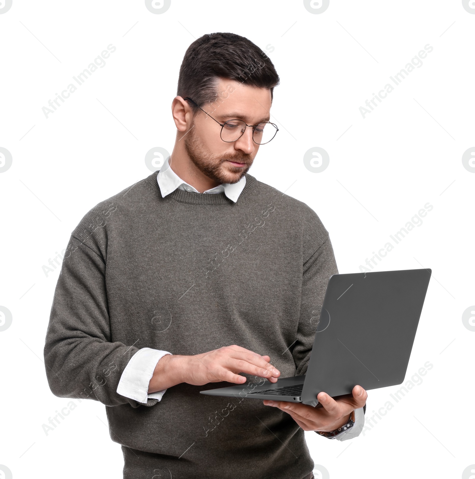 Photo of Handsome bearded businessman with laptop on white background