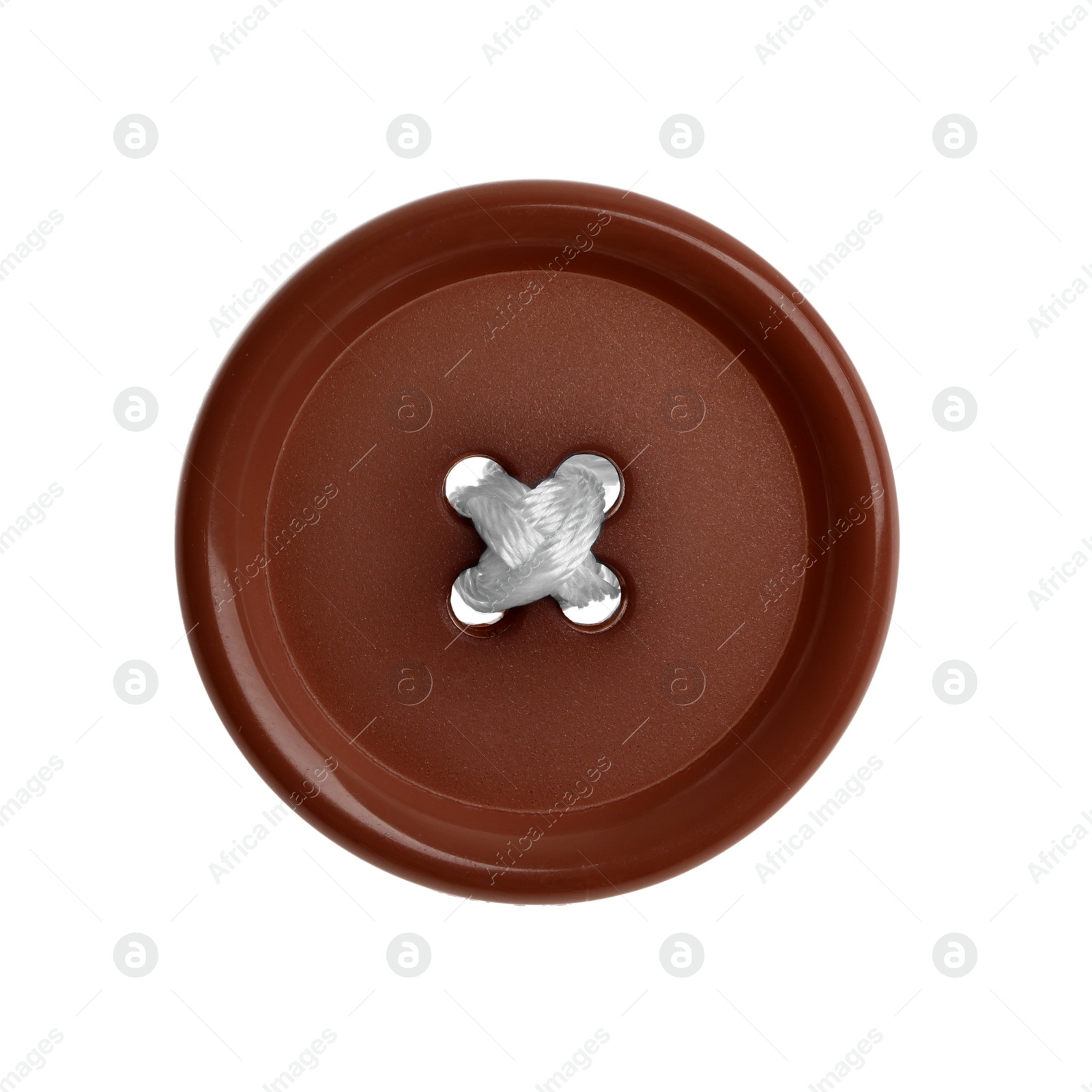 Photo of Brown plastic sewing button isolated on white, top view