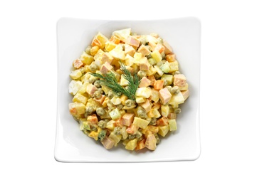 Photo of Delicious russian salad Olivier on white background, top view