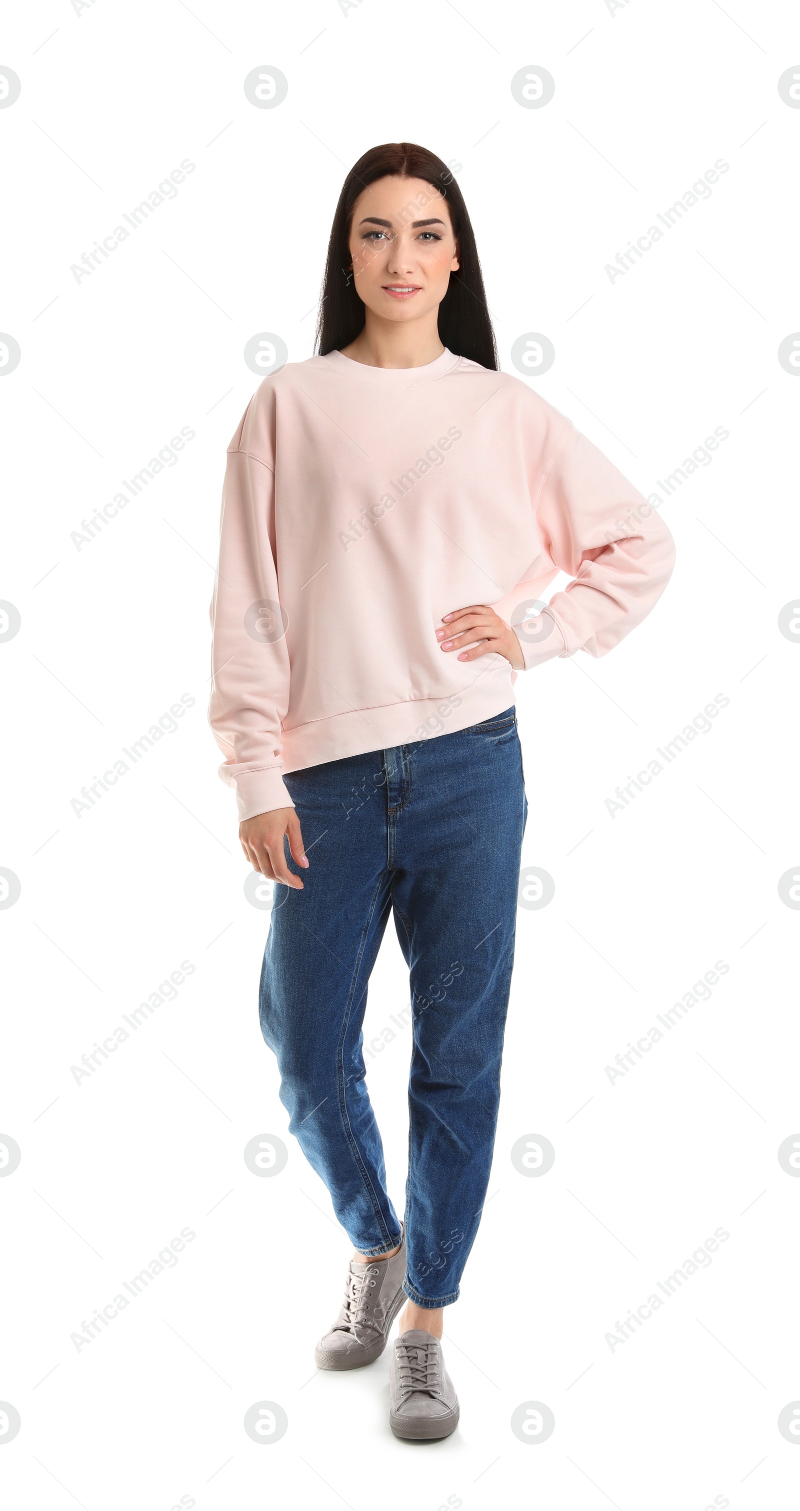 Photo of Full length portrait of young woman in sweater isolated on white. Mock up for design