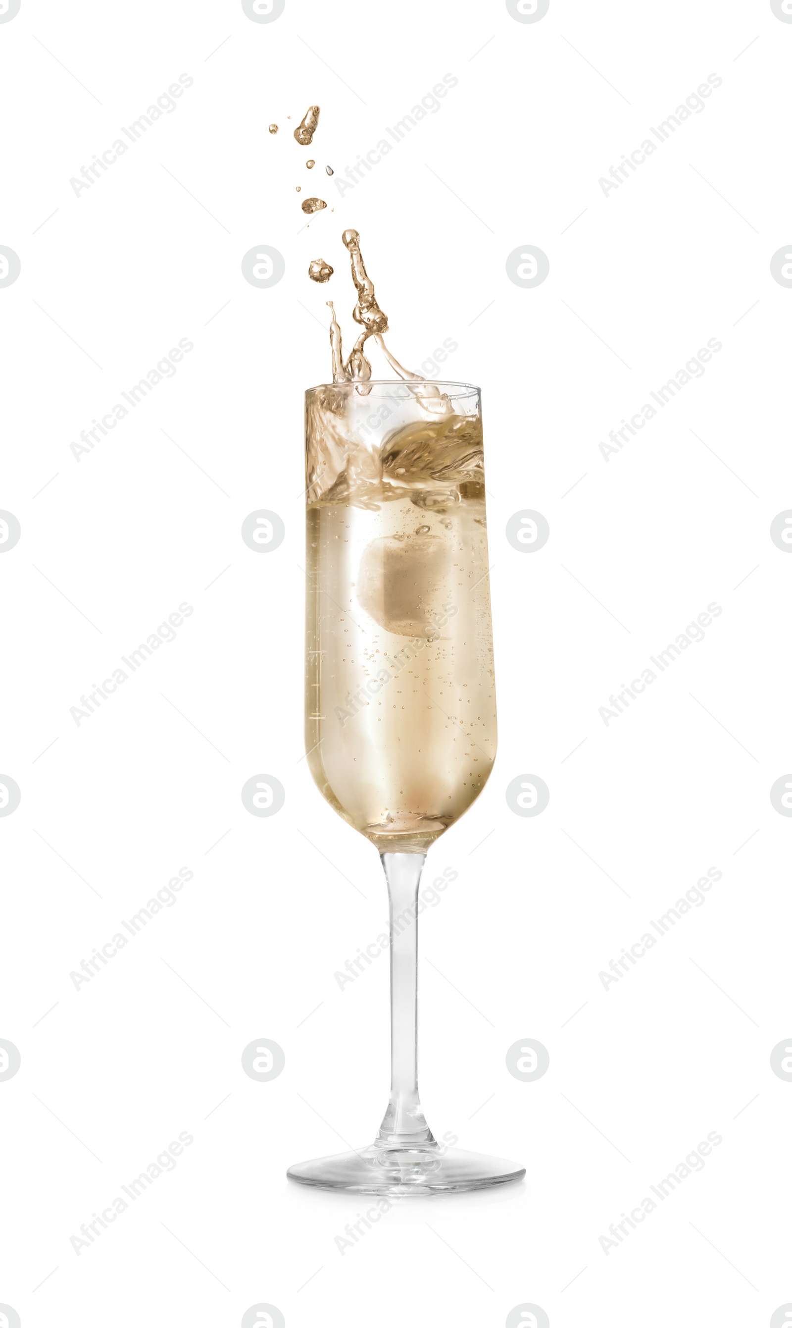 Photo of Sparkling wine splashing out of glass on white background