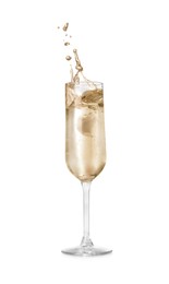 Photo of Sparkling wine splashing out of glass on white background