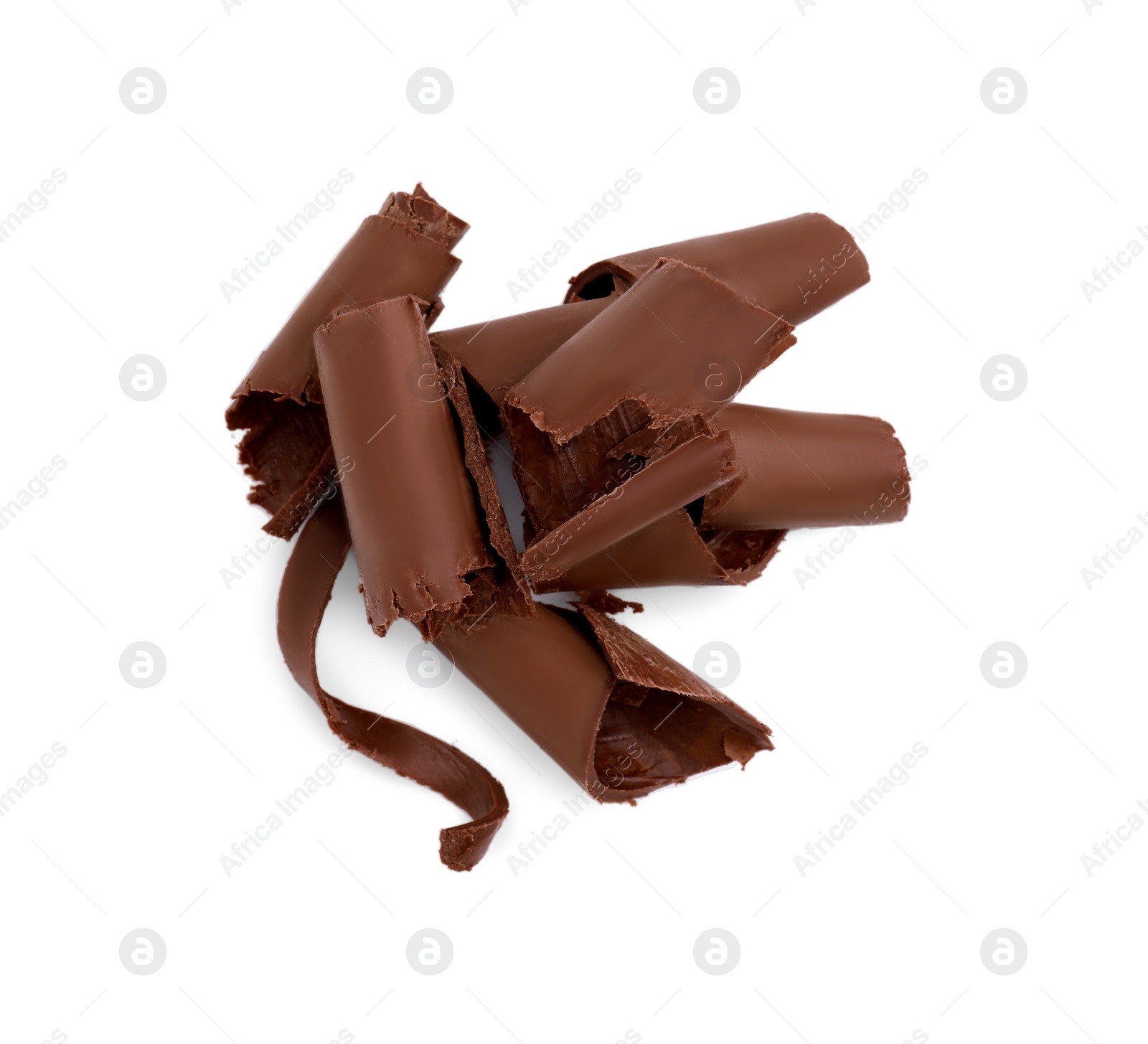 Photo of Pile of tasty chocolate curls isolated on white, top view