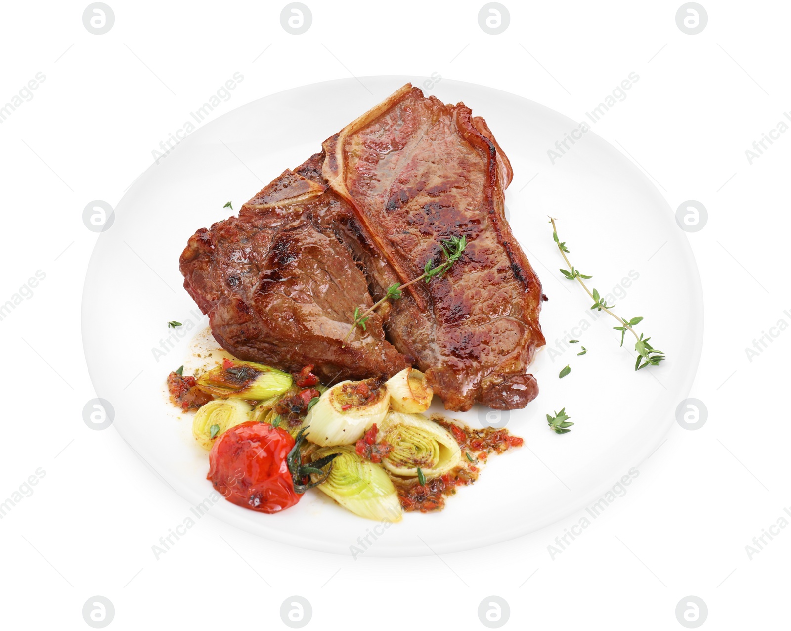 Photo of Delicious fried beef meat and vegetables isolated on white