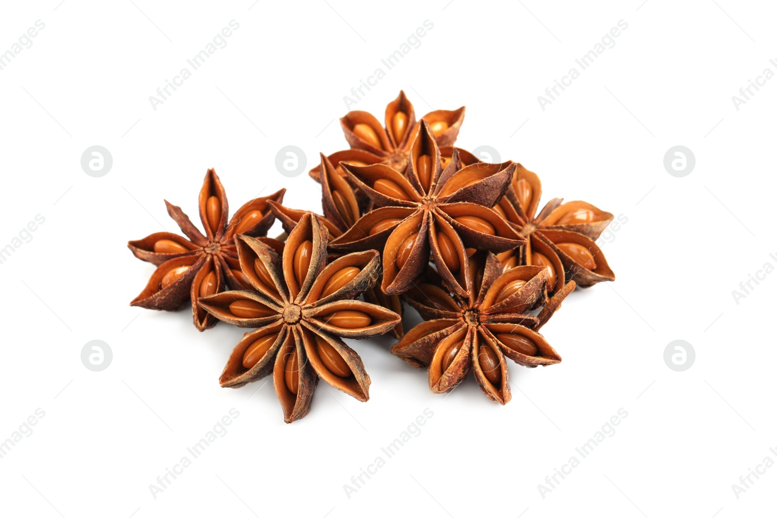 Photo of Dry anise stars with seeds on white background