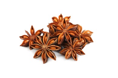 Dry anise stars with seeds on white background