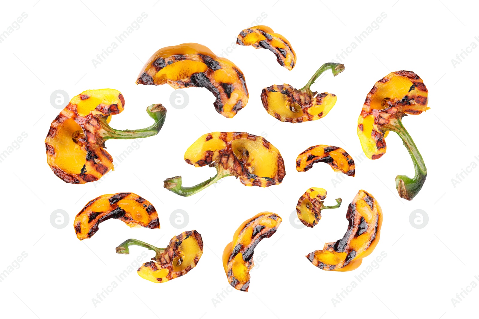 Image of Slices of grilled bell peppers in air on white background