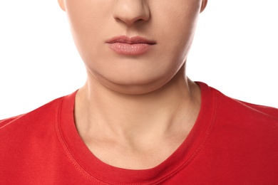 Young woman with double chin on white background, closeup