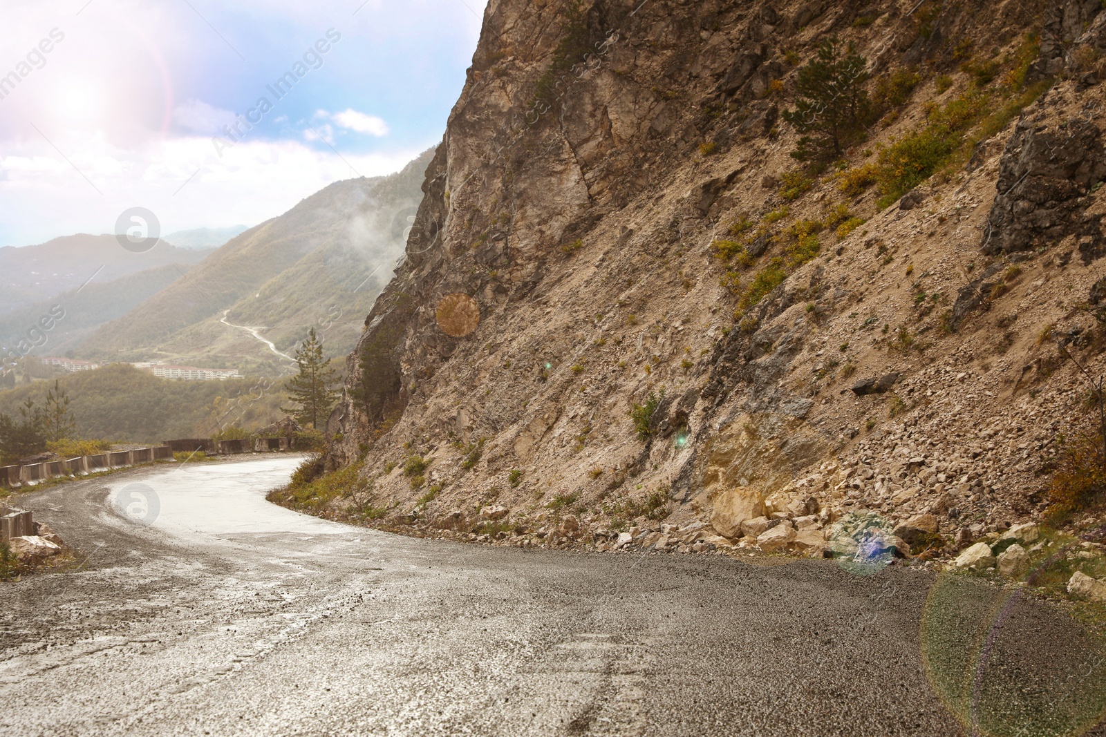 Photo of Picturesque view of empty road near mountains