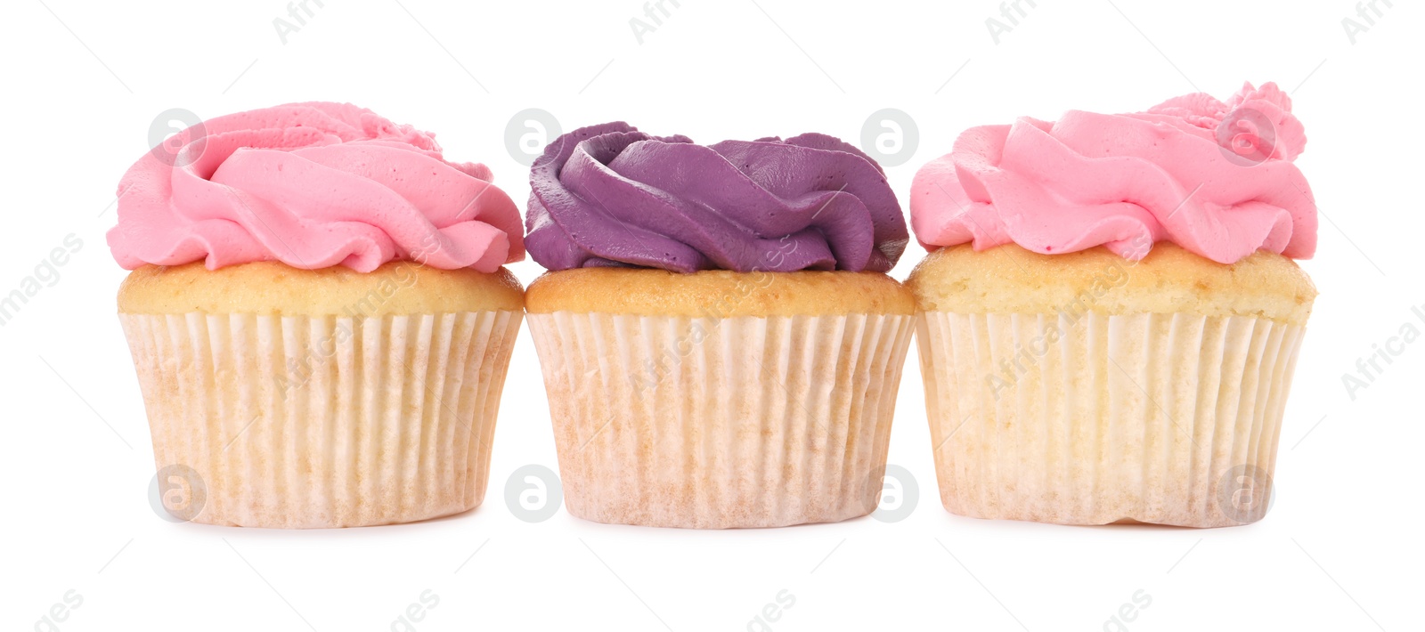 Photo of Delicious cupcakes with bright cream isolated on white