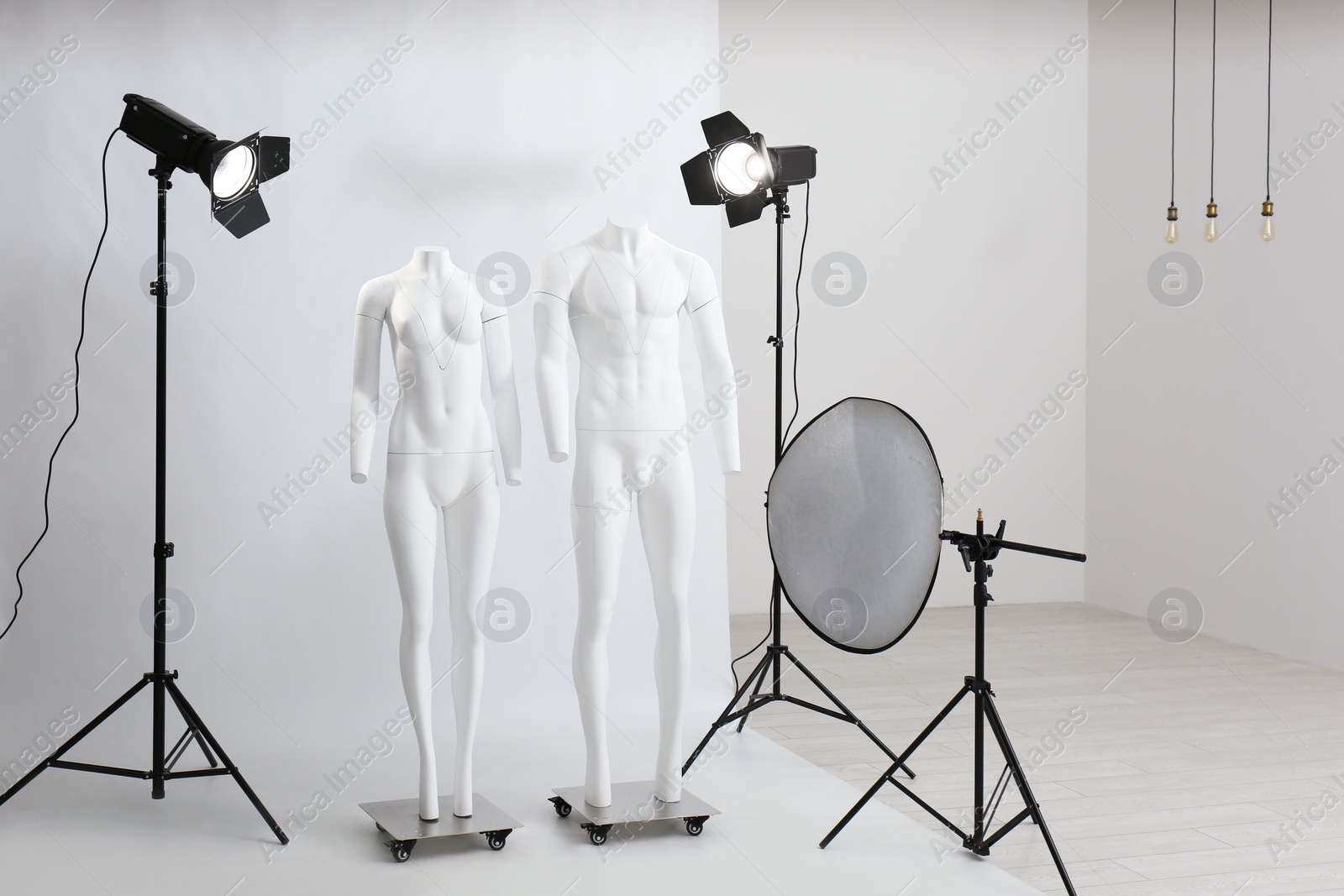 Photo of Modern ghost mannequins in professional photo studio