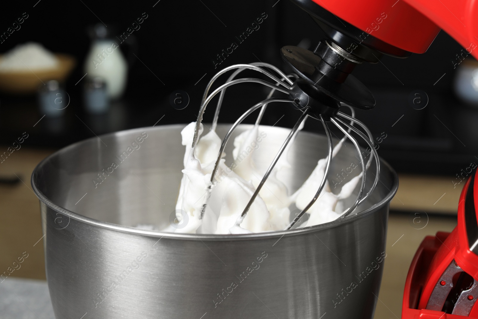 Photo of Modern stand mixer in kitchen, closeup. Home appliance