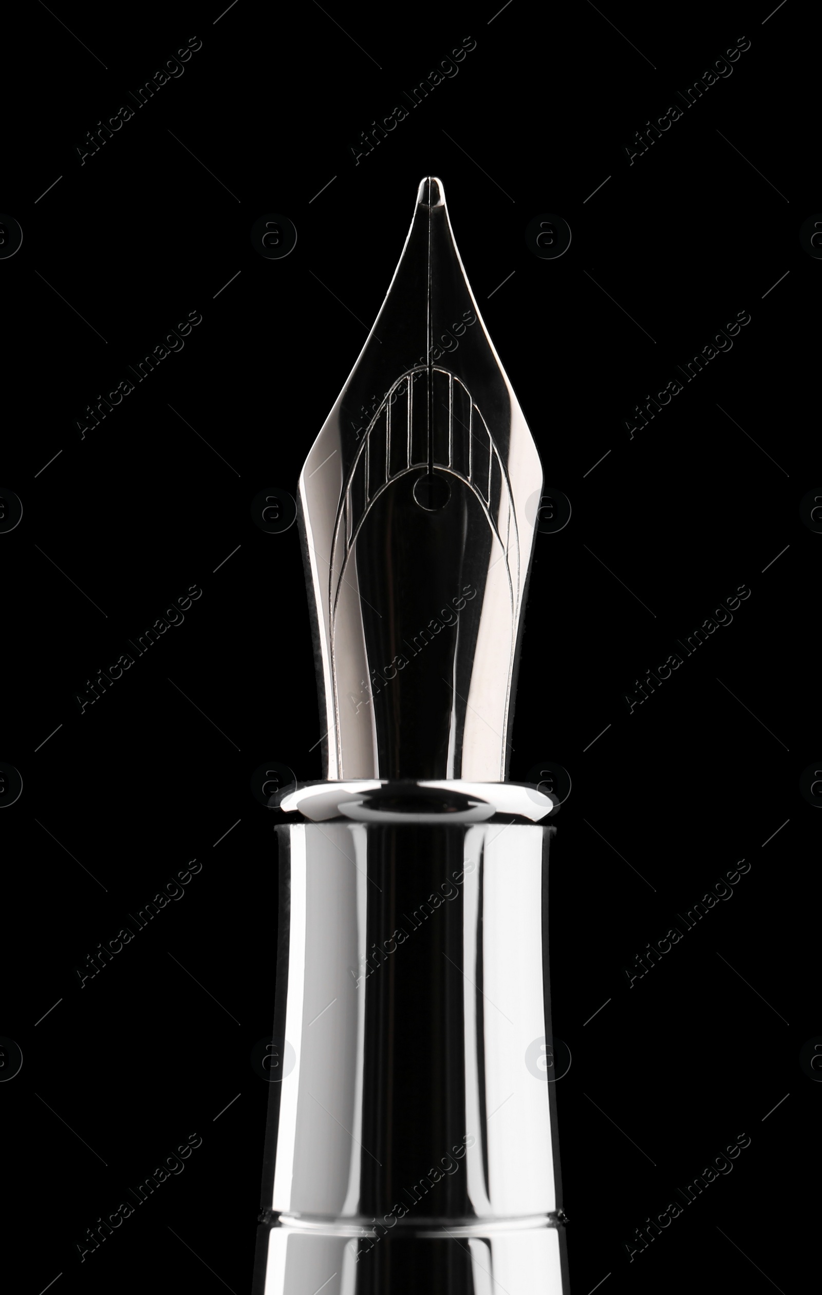 Photo of Stylish silver fountain pen on black background, closeup