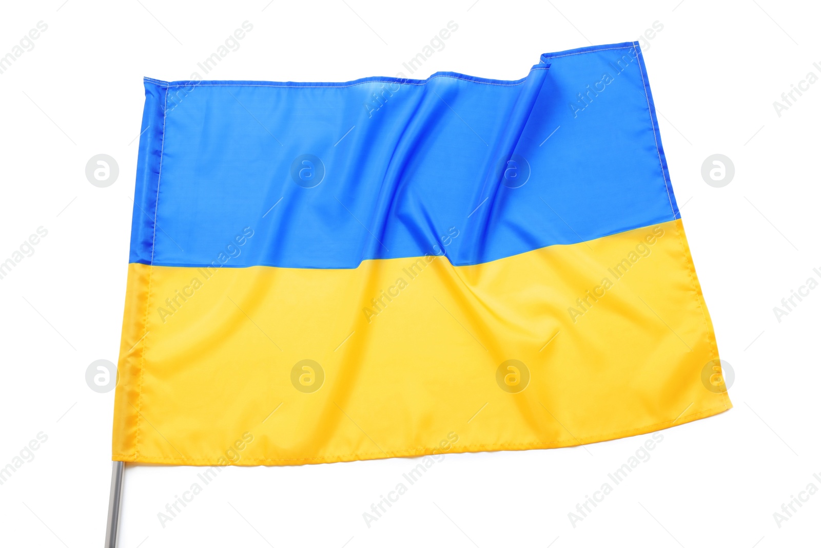 Photo of National flag of Ukraine isolated on white, top view