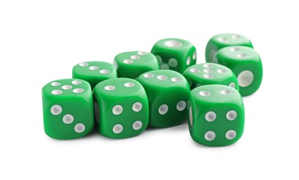 Photo of Many green game dices isolated on white