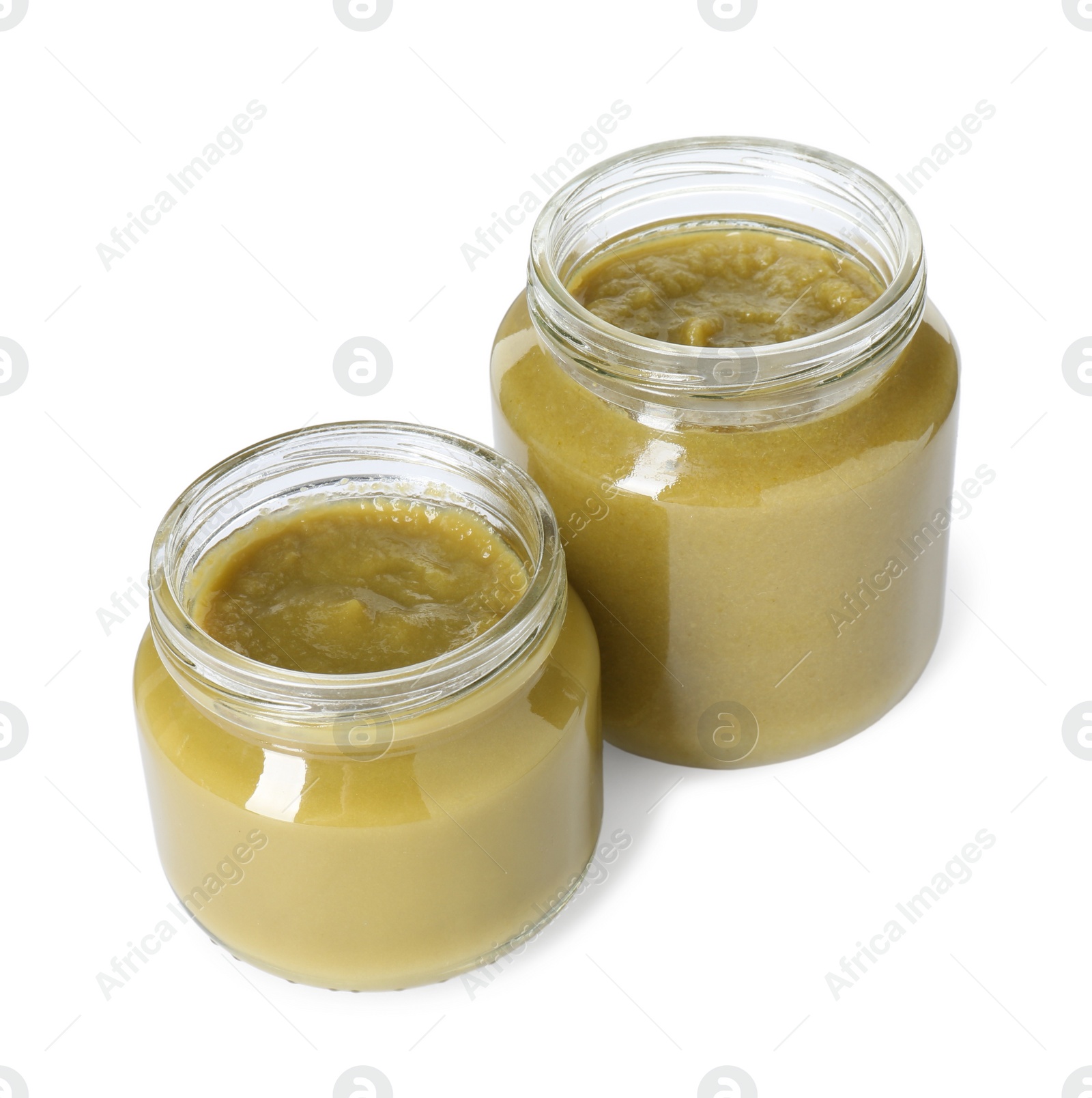 Photo of Baby food. Tasty healthy puree in jars isolated on white