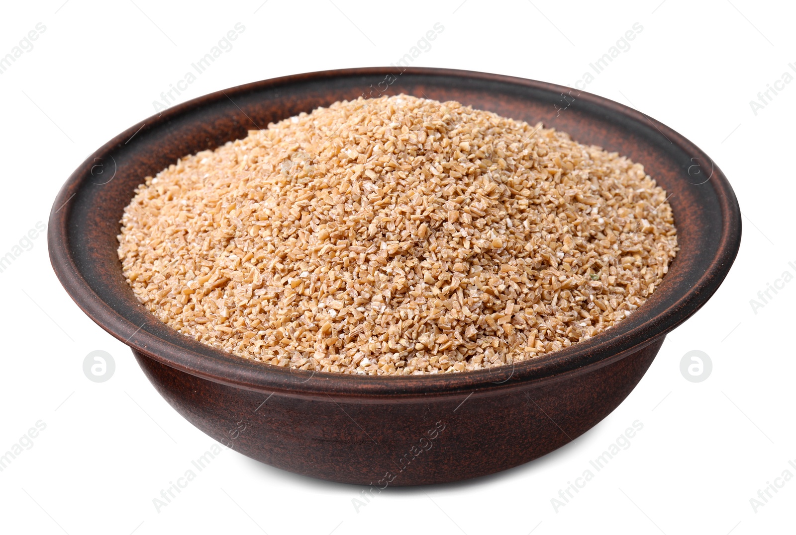 Photo of Dry wheat groats in bowl isolated on white